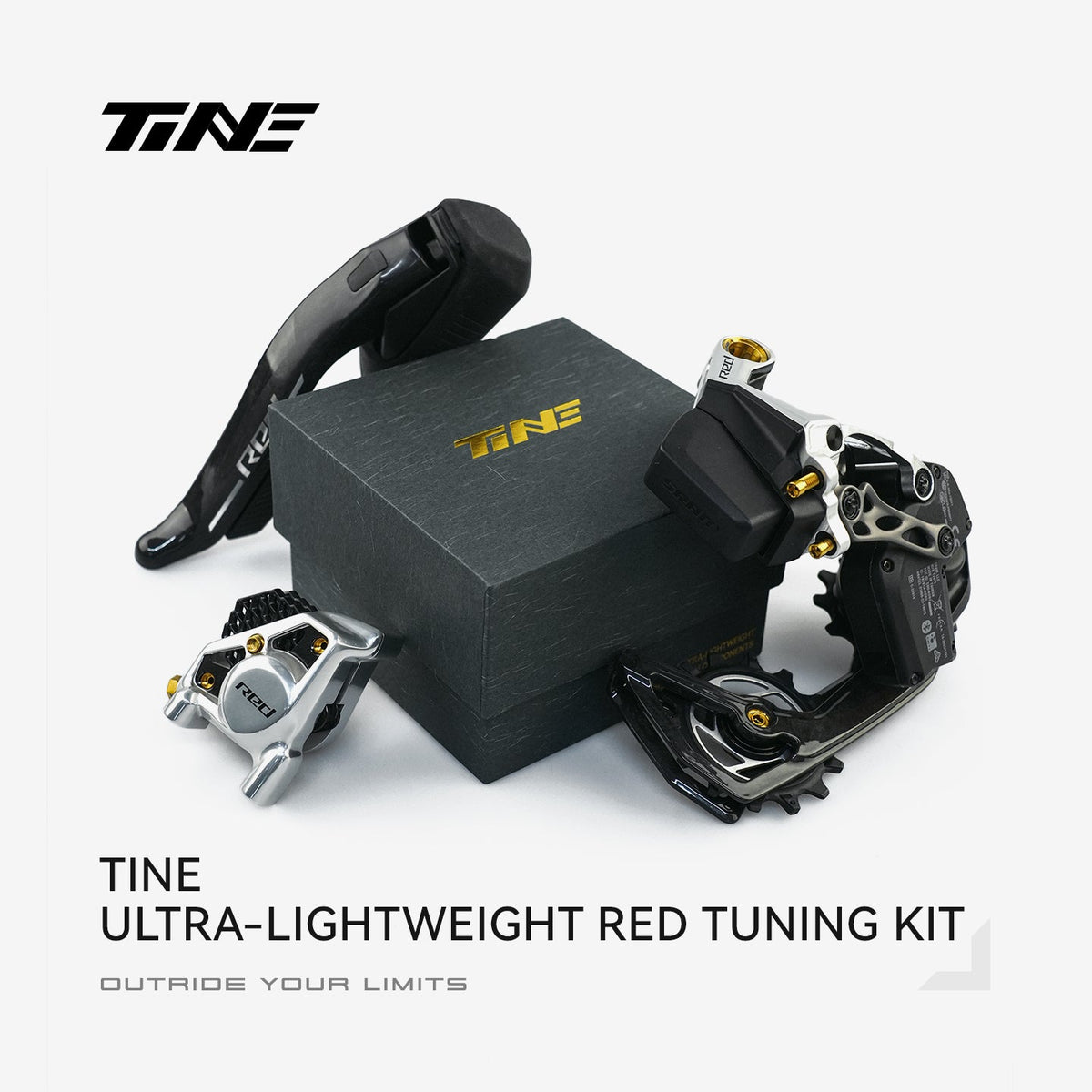 TiNE Kit de Tornillería de Titanio SRAM Red en acabado Aureate Glow (dorado) junto a componentes SRAM Red