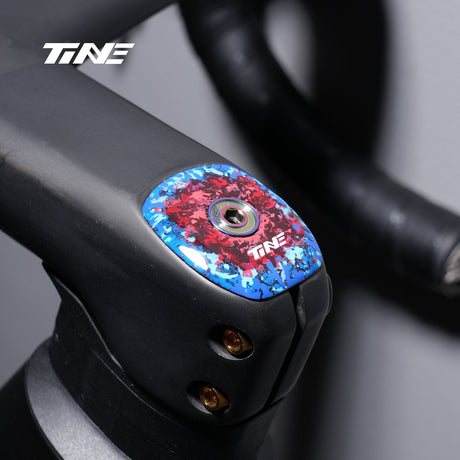 TiNE Top Cap de Carbono FDJ Team Edition montado en un cockpit Roval Rapide