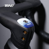 TiNE Top Cap de Carbono Quick-Step Edition montado en un cockpit Roval Rapide