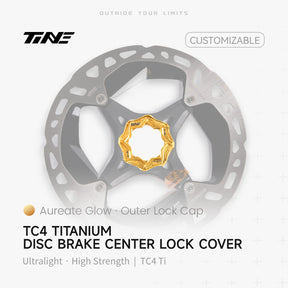 TiNE Tapa Center Lock Exterior de Titanio en acabado Aureate Glow (dorado) sobre un disco de freno