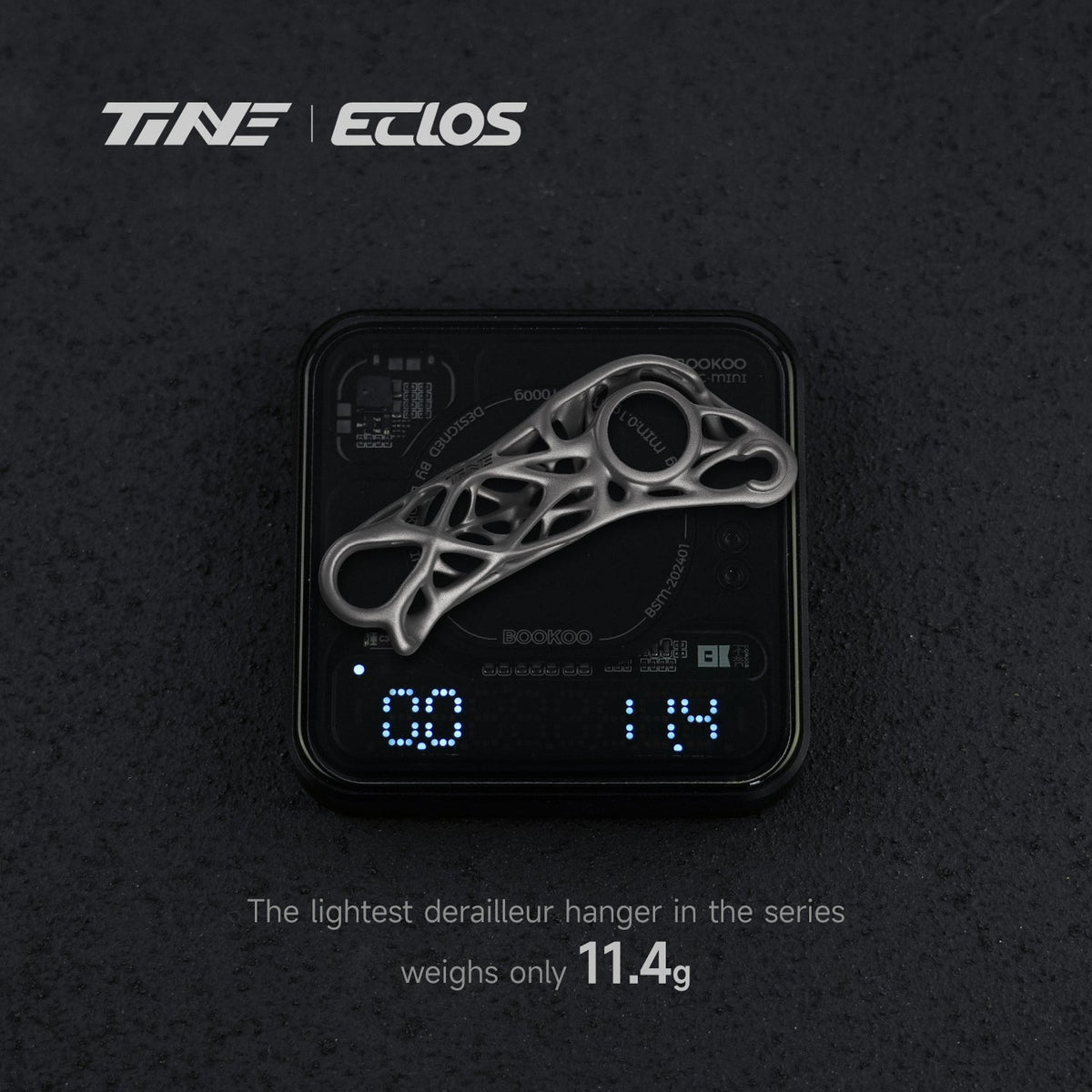 TiNE Eclos Patilla de Cambio de Titanio sobre una báscula que marca 11,4 g