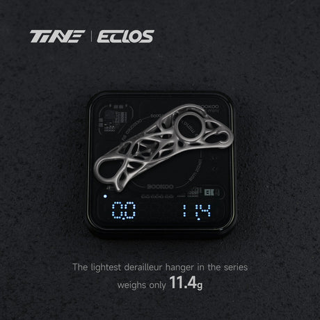 TiNE Eclos Patilla de Cambio de Titanio sobre una báscula que marca 11,4 g